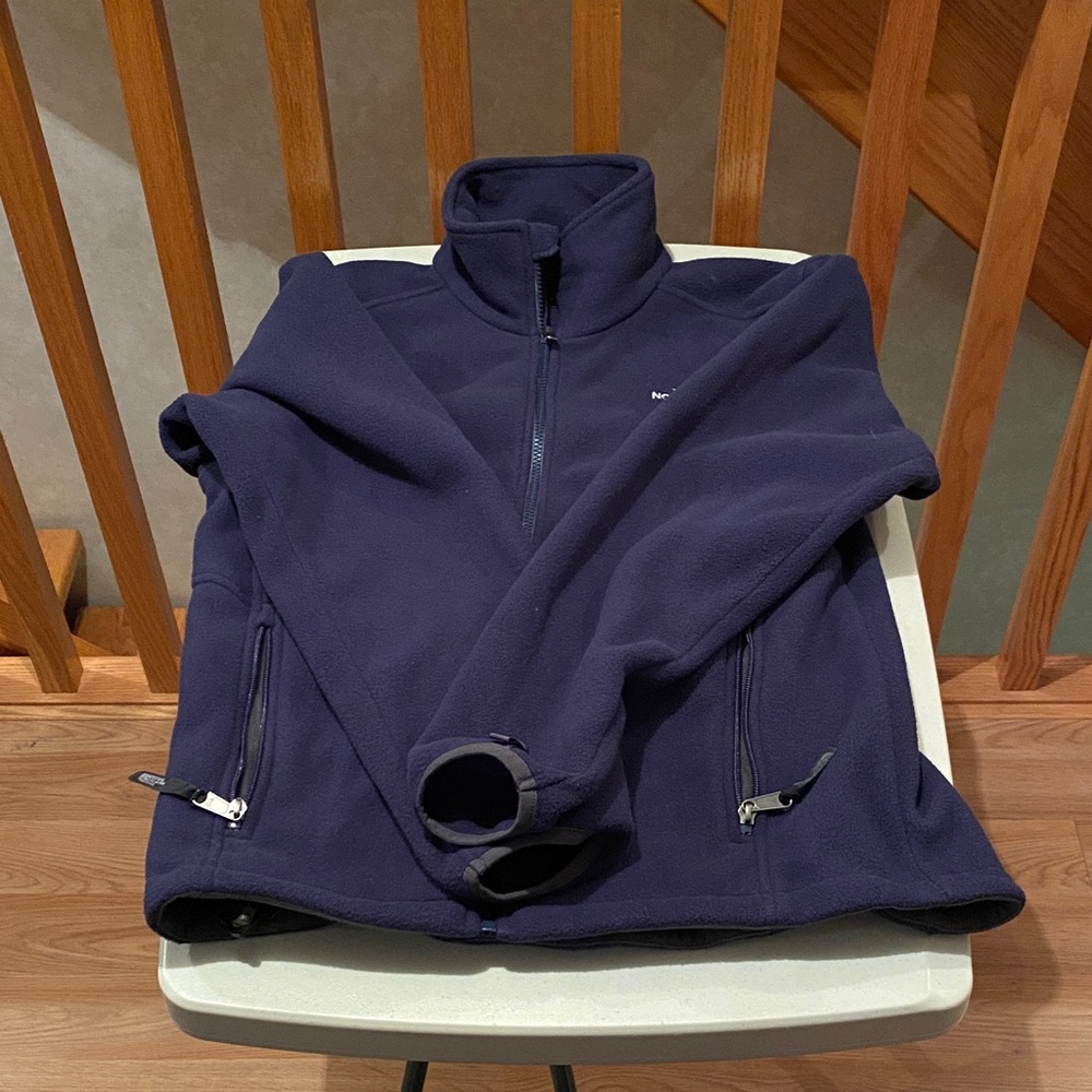 The North Face lightweight fleece jacket w/ no hood. Size: S. Color: Blue